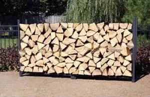 Stacked Logs on the Woodhaven 8’ Firewood Log Rack