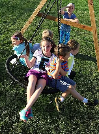 Fun on the M & M Sales Enterprises Web Riderz Swing